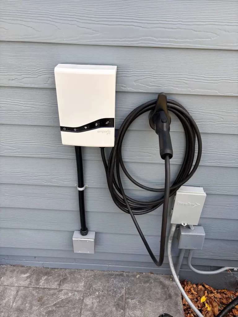 Milwaukee electrician installing home EV charger in garage